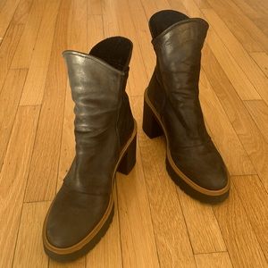 Free People black booties with brown trim